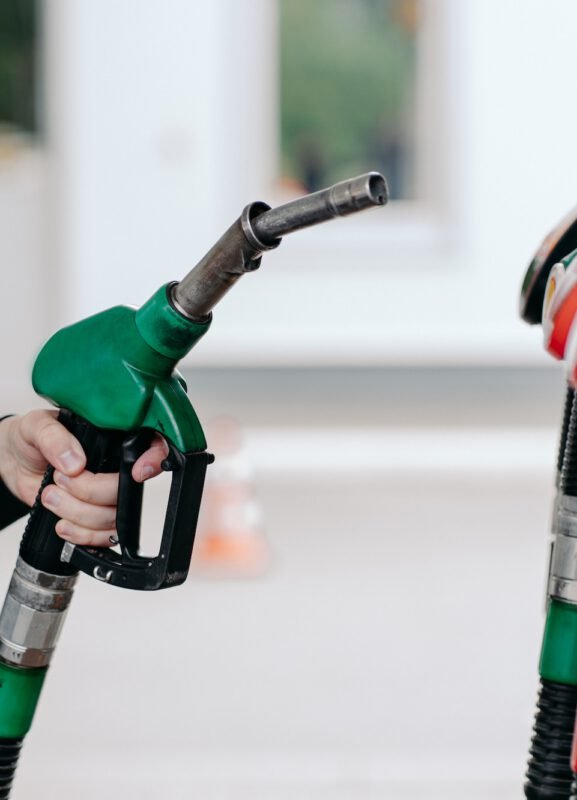 Car fueling concept. Mans hand using fuel nozzle at petrol station. Refueling pistols close up. Diesel and gas. Modern service SSUCv3H4sIAAAAAAAACpyRwW7DIAyG75P2DhHnRkrStFn2KtUOBtwGlUIFZNNU9d1nIFScd8Of7d/+zeP9rWkYB68E+2weMaJYab364CAoawh3u407NBJdTVCqYJ0CXUMOQSwGbkjQrFpH/ExJ5gOE1aOPwzYkIOCFNDJ8SeSNTjluSiIlqYNSjO0q5leeWEFZ/F+d+fFV3MAFjfhNC1dGHGqEbOSUS9n1J6C71dZglcpWrr6tAB0L9pXS3SmhzKVqs2FJVy5twq4muLjCa3Omrb0D1/HEZ9LEwhfwnspl4dUgQX9qb9UcY0MysKkyST8Rw34/jMfho5+noT/0+647bAX59xZFOmmdIkSxuCpZW1dxA8ZHlD2fZHsU09iOAKKdBzy3Q9+JaZbIz/NIh3/+AQAA//8DAGxerFOHAgAA